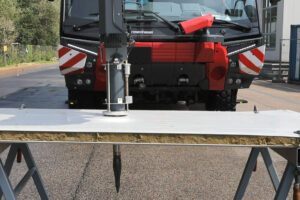 Piercing tool of the boom penetrates the outer skin of the production hall